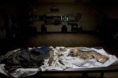 DIGITAL -- 113997 -- 9/16/04 -- The bones of a migrant woman found in the Arizona desert with her belongings at the Pima County Morgue. (Pat Shannahan/ The Arizona Republic)  (10/9/04 The remains of an undocumented immigrant woman found in the desert on the Barry M. Goldwater Range lie in the Pima County Morgue)