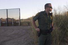 11/5/08- U.S. Mexico Border---  Border Patrol agent William Schaeck listens to his radio while patroling the desert west of Naco where the fence meets the San Pedro River. . (Pat Shannahan/ The Arizona Repubic)