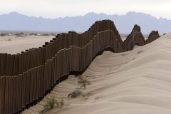 2/15/08- The new border fence , seen from the Mexican side of the border East of San Luis,  runs through sand dunes Feb. 15, 2008. (Pat Shannahan/ The Arizona Republic)